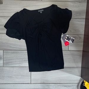 I bought it from Macy it still has the tag it is a size M